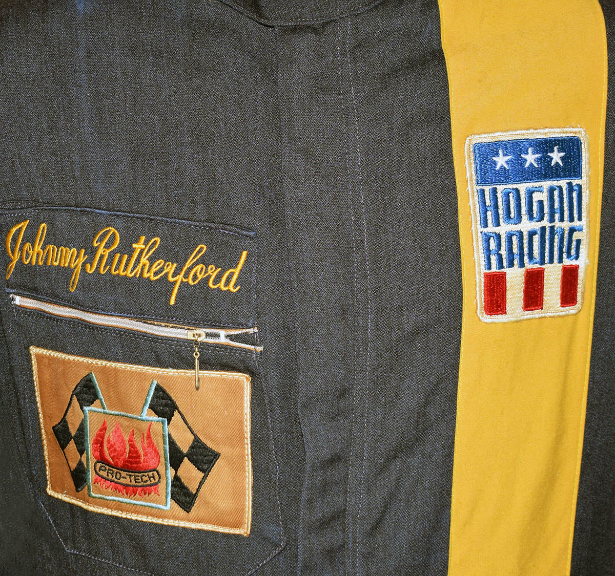 1974-Johnny-Rutherford-Signed-Race-Used-Hogan-Racing-F5000-Suit-2_3000x_6326e232-a7b4-4b2e-b54b-4f6327bcf442 - Rustle Racewear