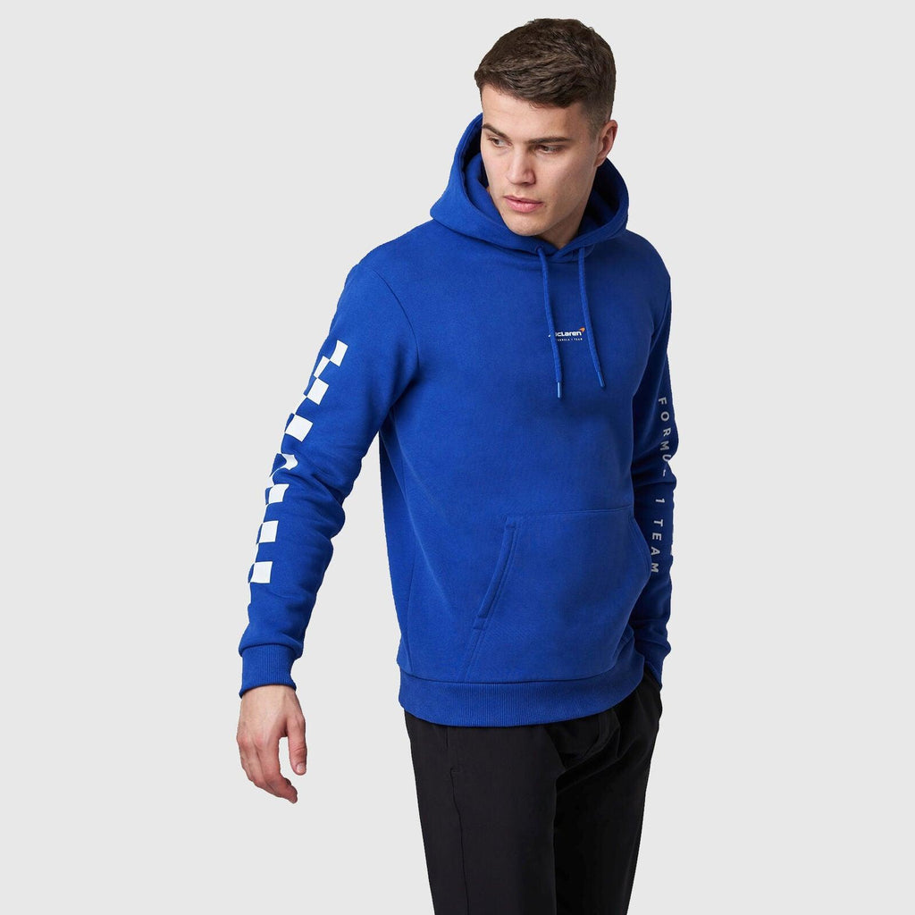 Blue McLaren F1 Dynamic Pack logo hoodie with checkered flag sleeve details