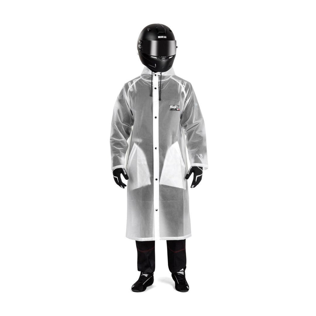 Sparco Raincoat Evo waterproof karting jacket worn by a racer with a black helmet.