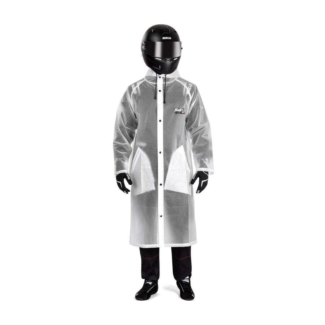 Sparco Raincoat Evo waterproof karting jacket worn by a racer with a black helmet.